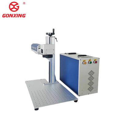 I negozi di abbigliamento traggono vantaggio dalla macchina di stampa laser a tavolo in fibra 3D 2D con potenza di raffreddamento ad acqua 10 a 100%